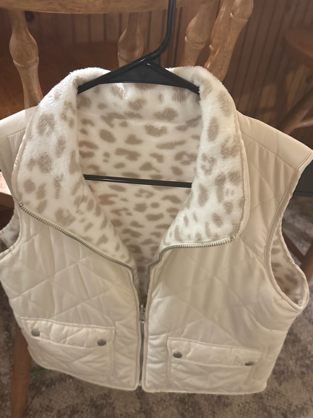 White and leopard vest. Fleece material inside